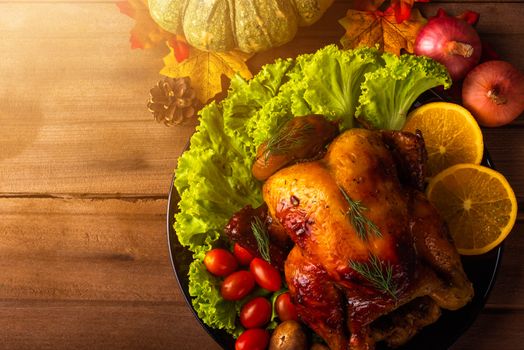 Thanksgiving baked turkey or chicken and vegetables, Christmas dinner feast food decoration, studio shot on wooden table background, Happy thanksgiving day of holiday concept