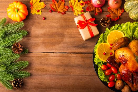 Thanksgiving baked turkey or chicken and vegetables, Christmas dinner feast food decoration, studio shot on wooden table background, Happy thanksgiving day of holiday concept