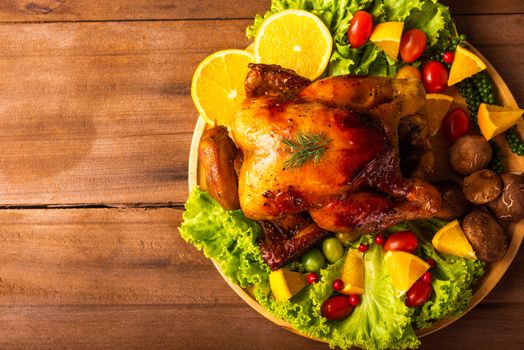 Thanksgiving roast turkey or chicken and vegetables, Top view Christmas dinner feast food decoration traditional homemade on wooden table background, Happy thanksgiving day of holiday concept