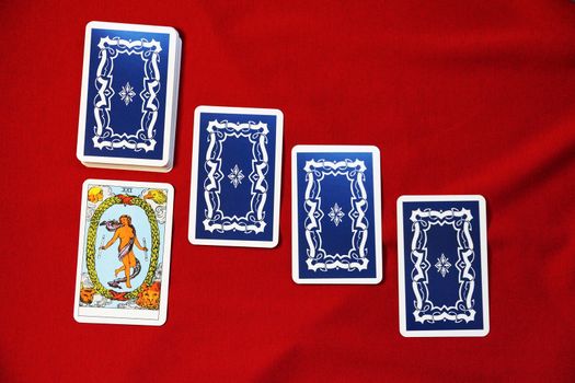 spread out tarot cards on red material, tarot card Peace