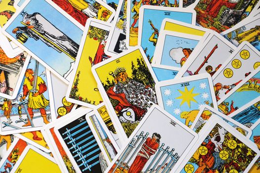 esoteric background of scattered tarot cards