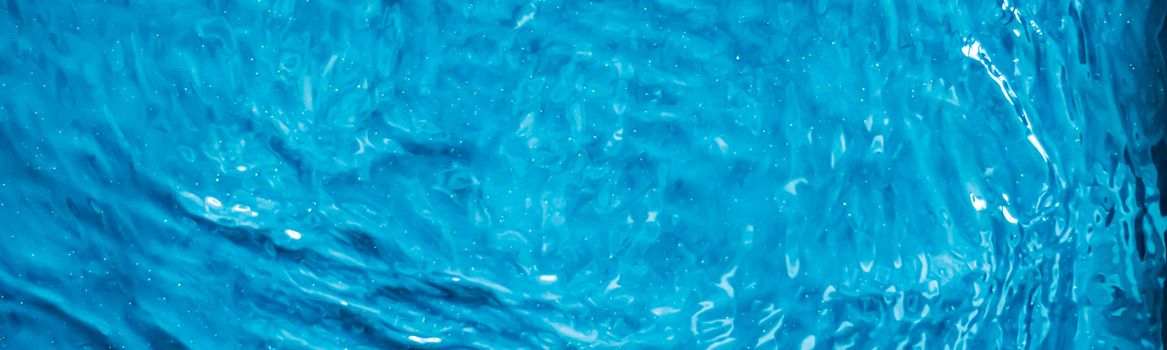 Blue water texture as abstract background, swimming pool and waves designs
