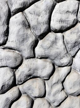 Black and white texture of a wall made of stones. Abstract background for design.