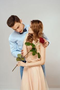 man giving woman roses relationship charm lifestyle embrace lifestyle. High quality photo