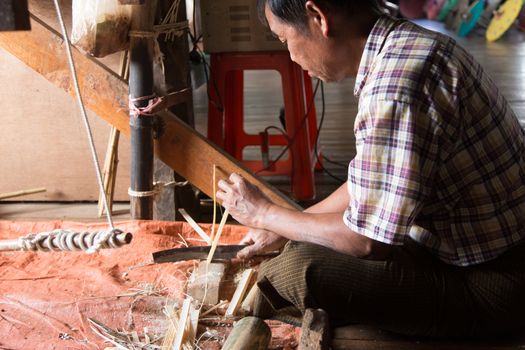 Inle Lake, Myanmar 12/16/2015 traditional paper making workshop in floating village. High quality photo