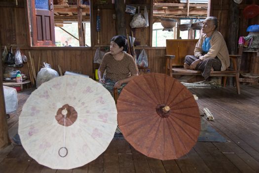 Inle Lake, Myanmar 12/16/2015 traditional paper making workshop in floating village. High quality photo