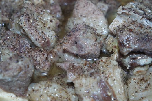 Top view of siri paaye or paya dish garnished with diced ginger, long coriander and black pepper. This dish is popular in Pakistan and Bangladesh
