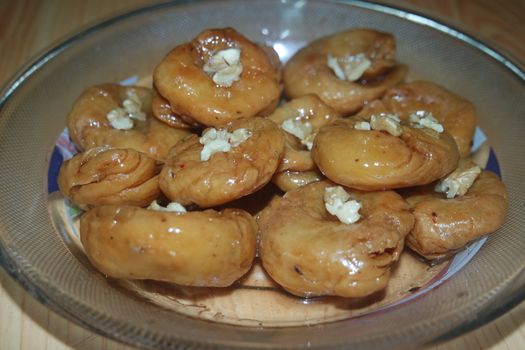 Closeup of delicious and tasty Asian sweet dish called balu shahi or baloshahi or balushahi. This dish is street sweet found in Pakistan India and Bangladesh and served in the festivities.