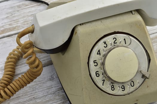 old rotary dial phone, side view, close-up