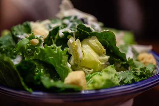 Macro shot of green salad in bowl