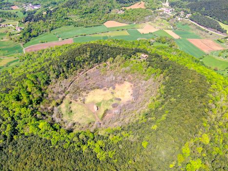 The Santa Margarida Volcano is an extinct volcano in the comarca of Garrotxa, Catalonia, Spain. The volcano has a perimeter of 2 km and a height of 682 meters in Garrotxa Volcanic Zone Natural Park