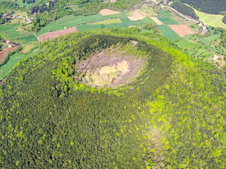 The Santa Margarida Volcano is an extinct volcano in the comarca of Garrotxa, Catalonia, Spain. The volcano has a perimeter of 2 km and a height of 682 meters in Garrotxa Volcanic Zone Natural Park