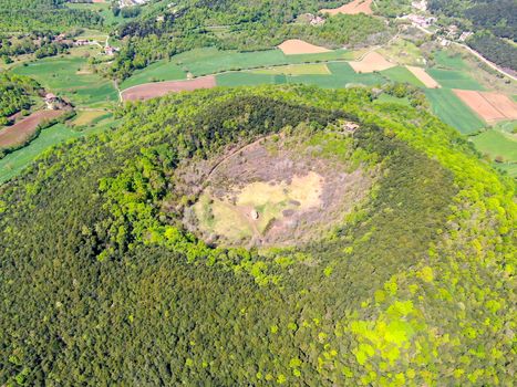 The Santa Margarida Volcano is an extinct volcano in the comarca of Garrotxa, Catalonia, Spain. The volcano has a perimeter of 2 km and a height of 682 meters in Garrotxa Volcanic Zone Natural Park