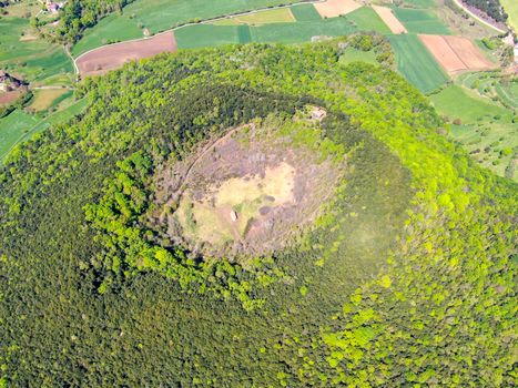 The Santa Margarida Volcano is an extinct volcano in the comarca of Garrotxa, Catalonia, Spain. The volcano has a perimeter of 2 km and a height of 682 meters in Garrotxa Volcanic Zone Natural Park