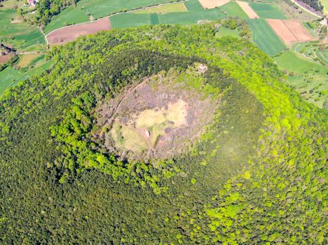 The Santa Margarida Volcano is an extinct volcano in the comarca of Garrotxa, Catalonia, Spain. The volcano has a perimeter of 2 km and a height of 682 meters in Garrotxa Volcanic Zone Natural Park