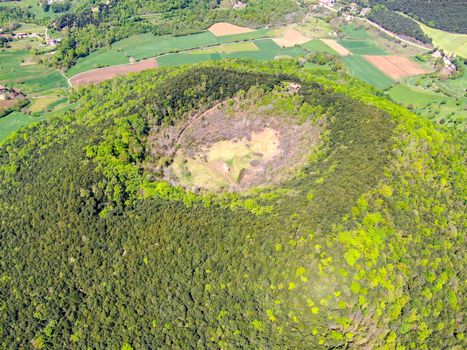 The Santa Margarida Volcano is an extinct volcano in the comarca of Garrotxa, Catalonia, Spain. The volcano has a perimeter of 2 km and a height of 682 meters in Garrotxa Volcanic Zone Natural Park