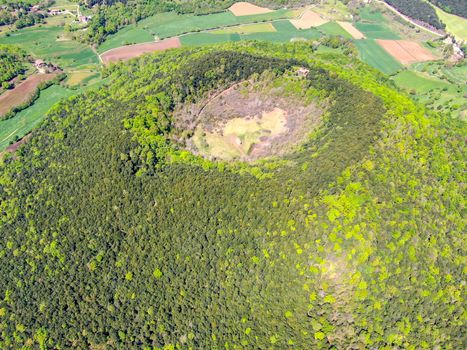 The Santa Margarida Volcano is an extinct volcano in the comarca of Garrotxa, Catalonia, Spain. The volcano has a perimeter of 2 km and a height of 682 meters in Garrotxa Volcanic Zone Natural Park