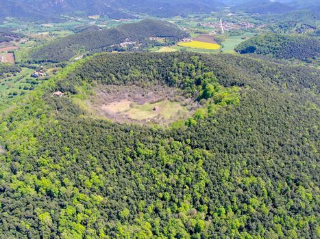 The Santa Margarida Volcano is an extinct volcano in the comarca of Garrotxa, Catalonia, Spain. The volcano has a perimeter of 2 km and a height of 682 meters in Garrotxa Volcanic Zone Natural Park