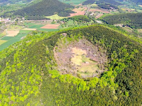 The Santa Margarida Volcano is an extinct volcano in the comarca of Garrotxa, Catalonia, Spain. The volcano has a perimeter of 2 km and a height of 682 meters in Garrotxa Volcanic Zone Natural Park