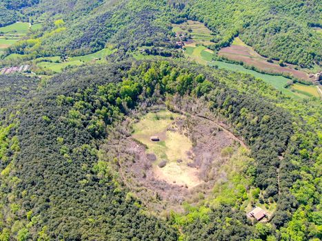 The Santa Margarida Volcano is an extinct volcano in the comarca of Garrotxa, Catalonia, Spain. The volcano has a perimeter of 2 km and a height of 682 meters in Garrotxa Volcanic Zone Natural Park