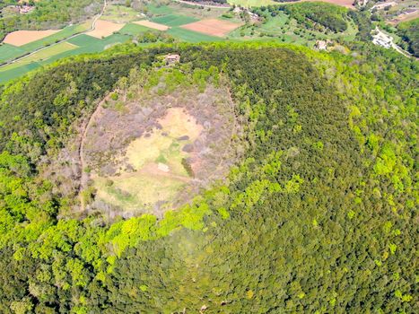 The Santa Margarida Volcano is an extinct volcano in the comarca of Garrotxa, Catalonia, Spain. The volcano has a perimeter of 2 km and a height of 682 meters in Garrotxa Volcanic Zone Natural Park