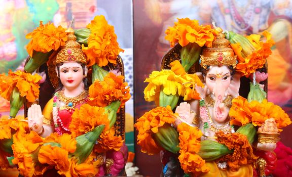 goddess lakshmi and lord ganesha at the time of prayer