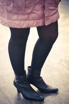 Slim model legs in stockings. winter fashion creation