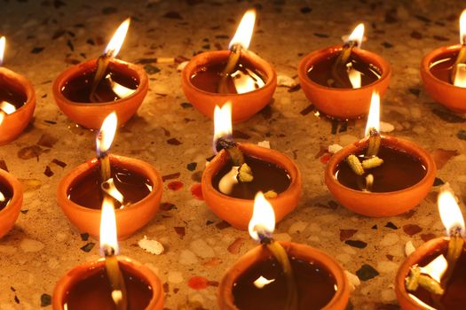 oil lamps lit beautifully in diwali festival