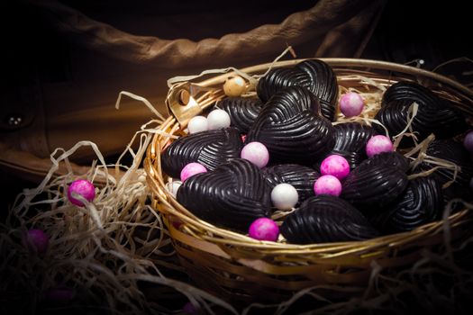 home made chocolates in metal basket with lady brown purse