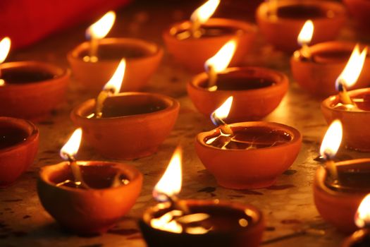 oil lamps lit on diwali festival

