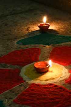 deepak with colorful rangoli
