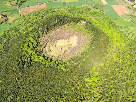 The Santa Margarida Volcano is an extinct volcano in the comarca of Garrotxa, Catalonia, Spain. The volcano has a perimeter of 2 km and a height of 682 meters in Garrotxa Volcanic Zone Natural Park