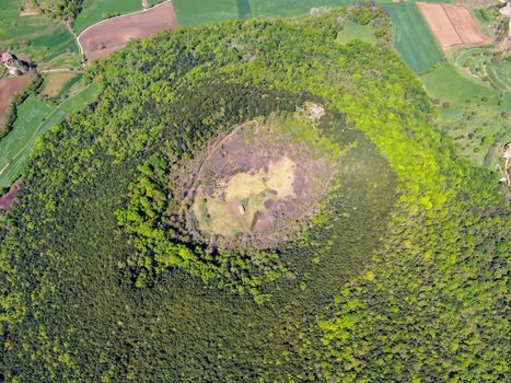 The Santa Margarida Volcano is an extinct volcano in the comarca of Garrotxa, Catalonia, Spain. The volcano has a perimeter of 2 km and a height of 682 meters in Garrotxa Volcanic Zone Natural Park