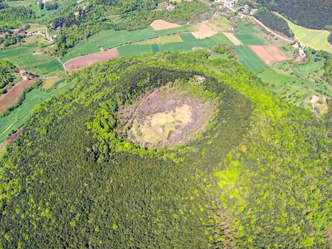 The Santa Margarida Volcano is an extinct volcano in the comarca of Garrotxa, Catalonia, Spain. The volcano has a perimeter of 2 km and a height of 682 meters in Garrotxa Volcanic Zone Natural Park