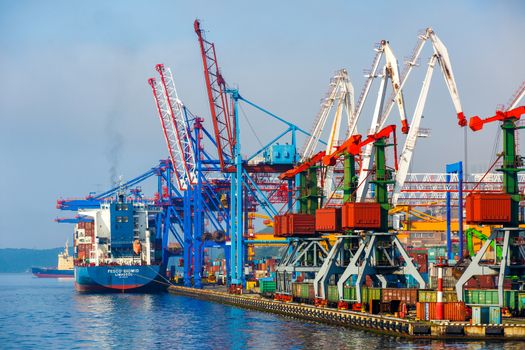 Summer, 2016 - Vladivostok, Russia - Vladivostok Sea Port. Commercial coasters are loading at the commercial port of Vladivostok.