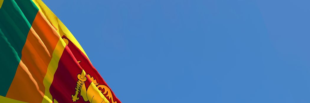 3D rendering of the national flag of Sri Lanka waving in the wind against a blue sky