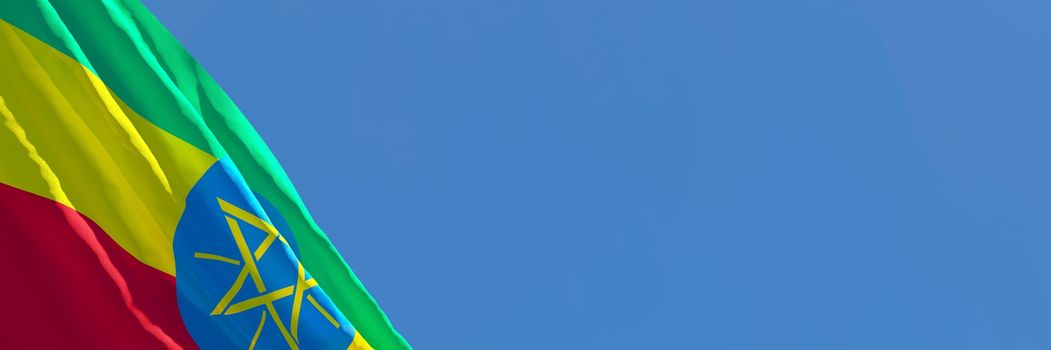 3D rendering of the national flag of Ethiopia waving in the wind against a blue sky