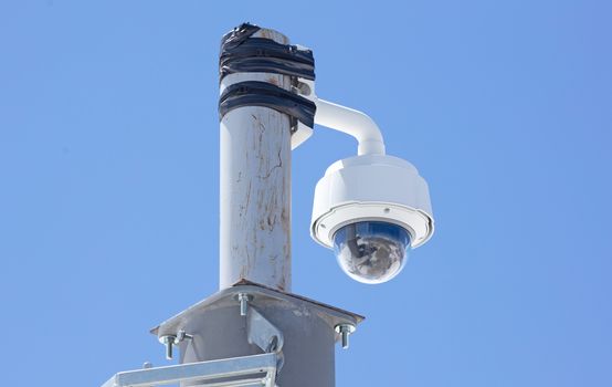 Security cam for video surveillance, blue background