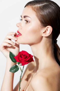 Sexy woman lipstick Rose gift for spa treatments light background
