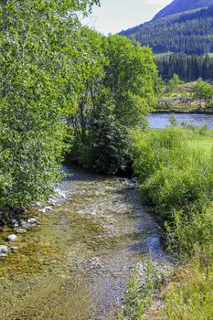 Flowing beautiful river lake Hemsila in Hemsedal, Viken, Buskerud, Norway.