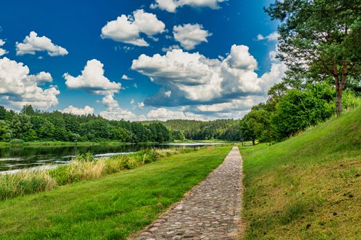 Beautiful Panoramic View With Amazing Clouds. Amazing River and Forest Landscape, Stepping Stone. Lithuania.