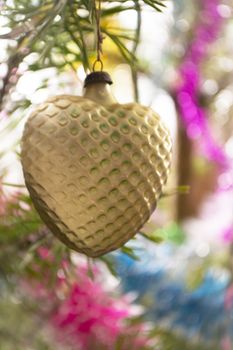 Decoration retro glass heart on Christmas tree from 70th urss, vertical image