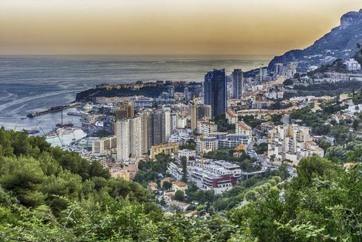 Panoramic view of Monaco at sunset from the Grande Corniche road, iconic landmark in Cote d'Azur, French Riviera