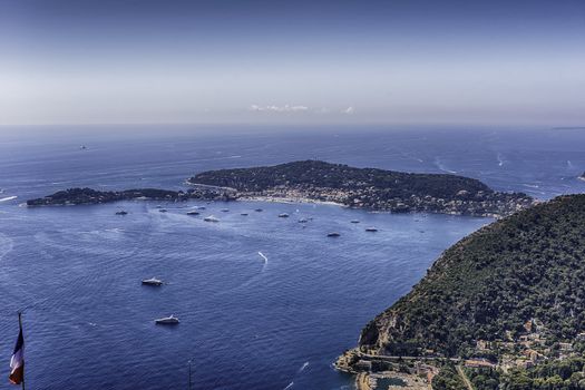 Scenic aerial view from the town of Èze over the beautiful coastline near the city of Nice, Cote d'Azur, France. It is one of the most renowned tourist site of the French Riviera