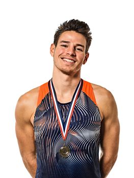 one young caucasian man athetle gold medalist athletics in studio isolated on white background