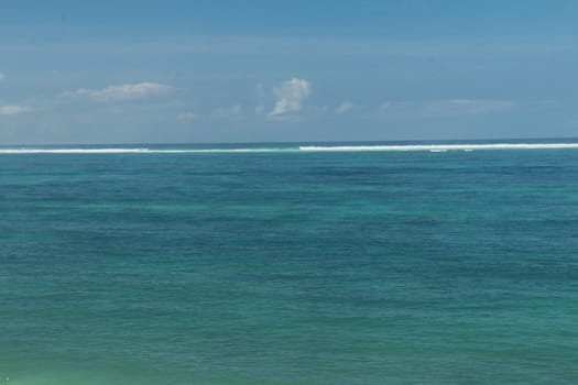 Blue sea and sky with white clouds. Holiday concept.