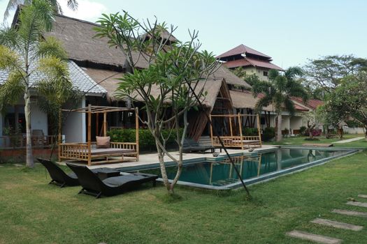 Luxury swimming pool in the tropical hotel.