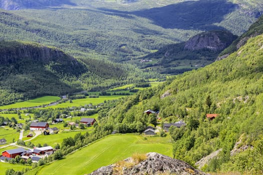 Panorama Norway, Hemsedal Mountains, red farmhouses and green meadows, Viken, Buskerud.