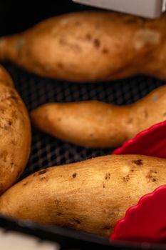 Roasted sweet potato cooked by airfryer at home. Healthy food for diet eating.