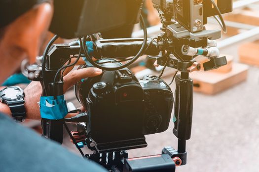 Film industry. Filming with professional camera background